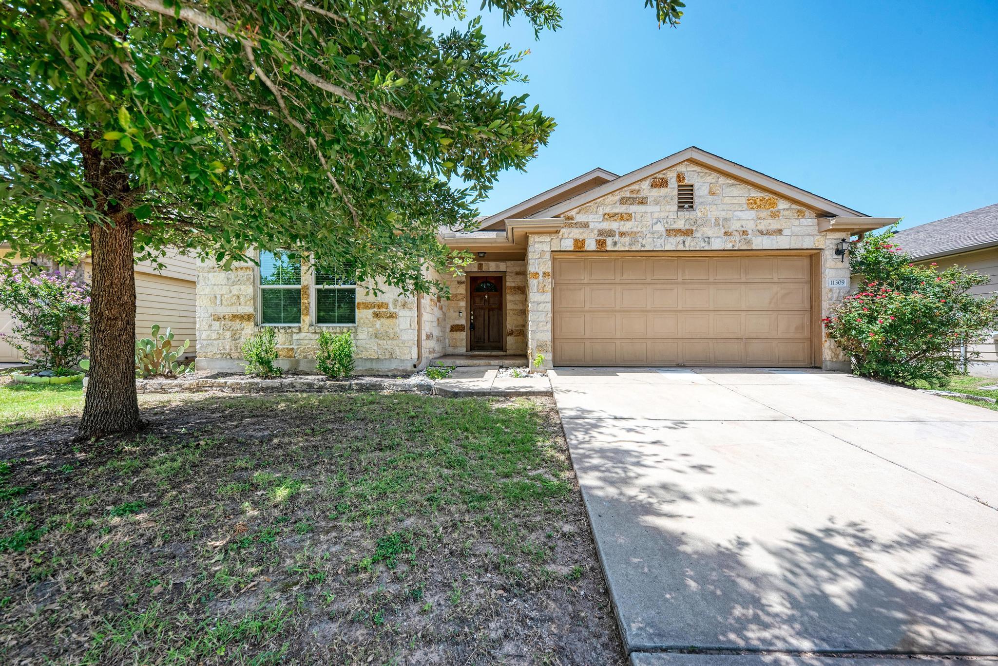 11309 Carrie Manor ST